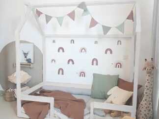 Bed like a thin wooden house with a fence