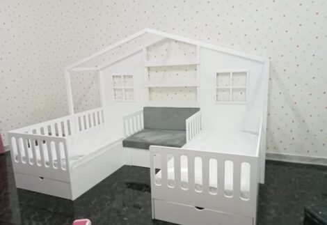 Two beds with a sofa
