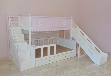 Bunk bed with a slide, stair, and CNC house shapes