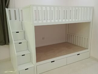 Bunk bed with railings at the top