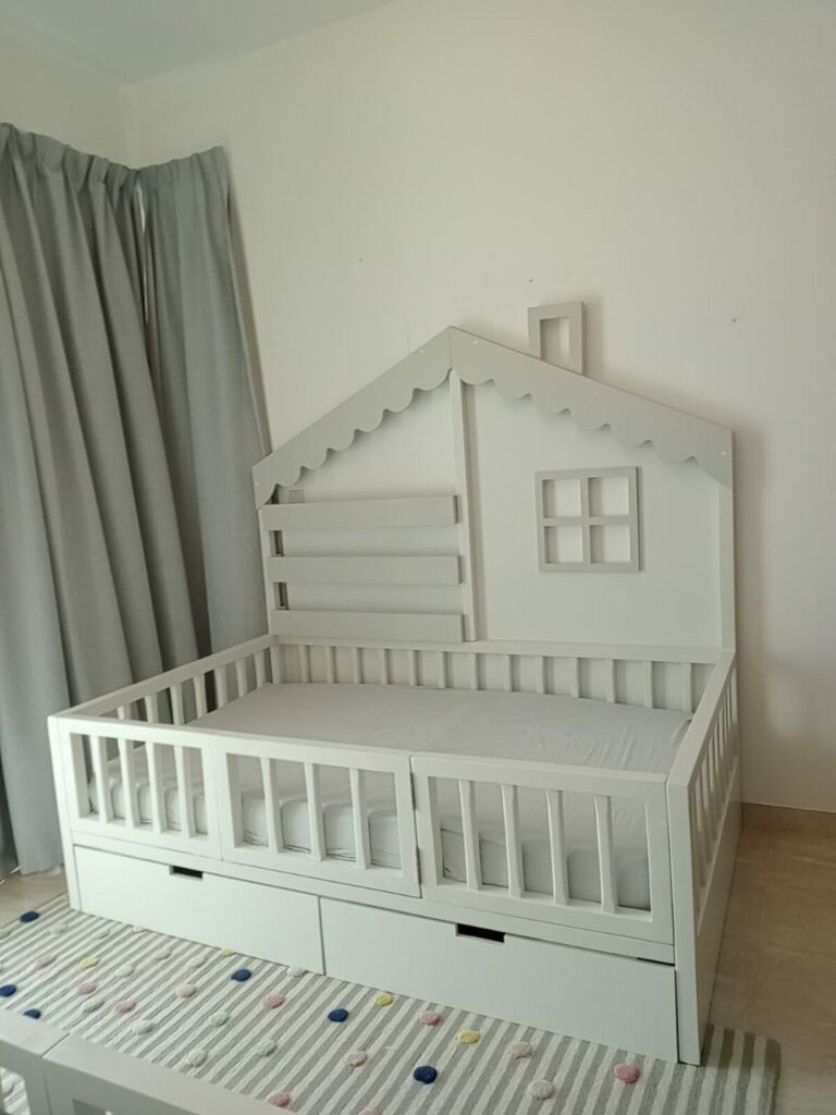 Shelved house bed with closed door