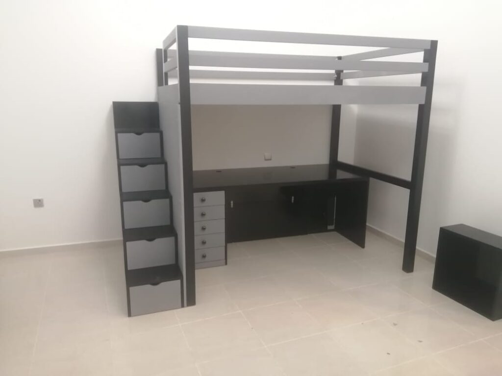 Loft bed with lower desk and side stair