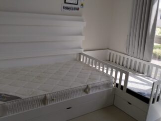 L SHAPED BED WITH BOOK SHELVS