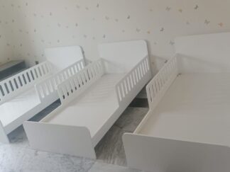 Bed with barriers