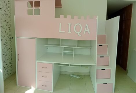 Loft bed, Below it is a large desk and a closet, with stairs with storage drawers.