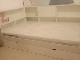 Bed with side shelves and bottom storage drawer