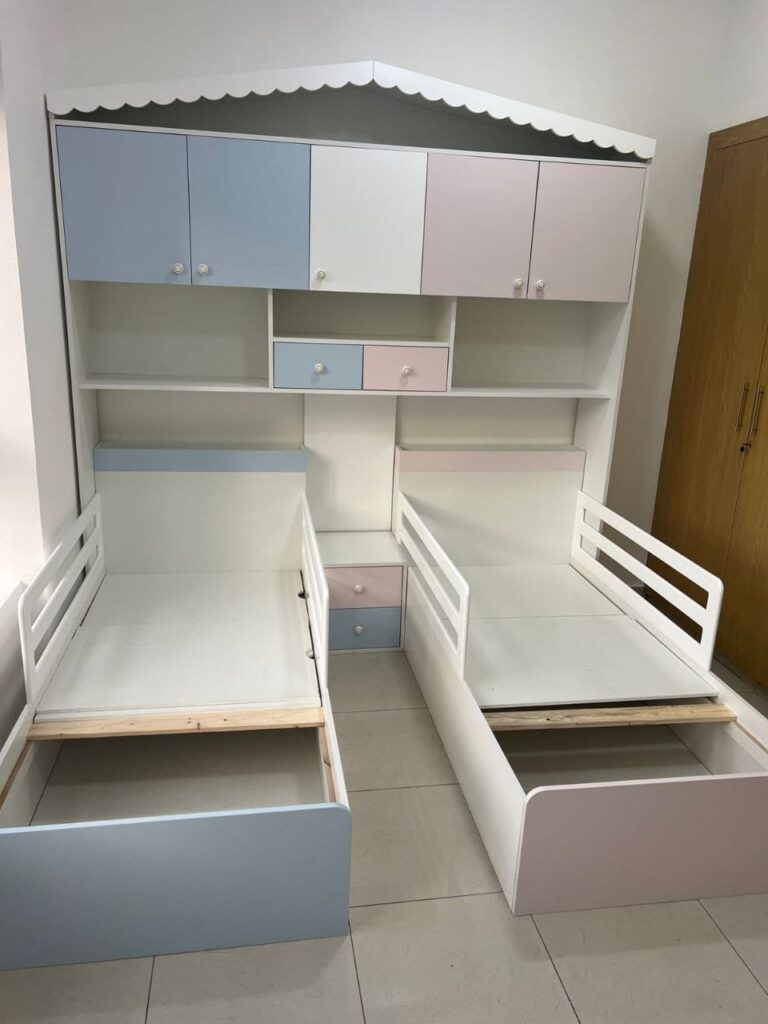2 beds, nightstand, overhead cabinets