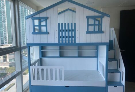 Bunk bed with wall shelves